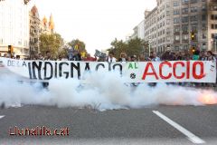 De la Indignació a l' Acció De la Indignació a l' Acció